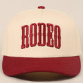 Rodeo Two-Tone Embroidered Trucker Hat — Wine Red Cotton Canvas with Raised Lettering & 5-Panel Structure