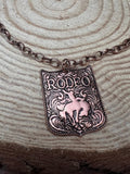 Rustic Brass Rodeo Pendant Necklace — 22 Inch Cowgirl Statement